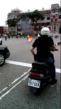 Protester Sets Himself on Fire to the Roar of the Motorcycle Engine 