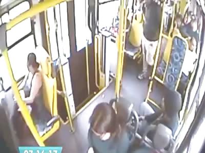 BUS ROBBER INJURED IN SHOOTOUT WITH COP