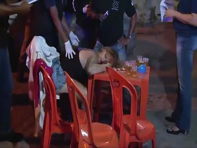 WOMAN WAS MURDERED WHILE SITTING AT THE BAR