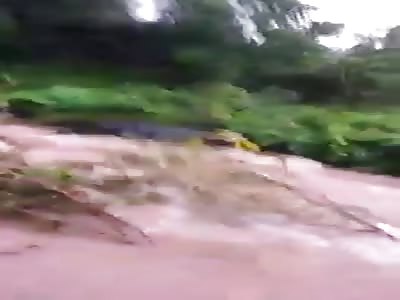 River takes truck and its occupants