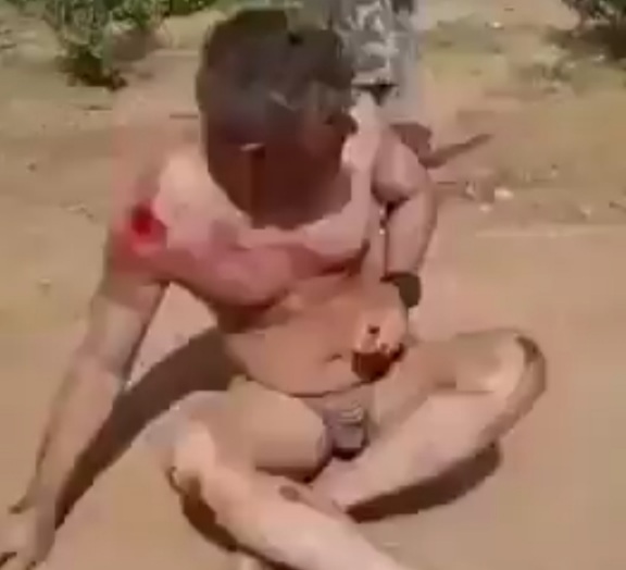 Boer Farmer being Beaten by Racist Black South Africans. 