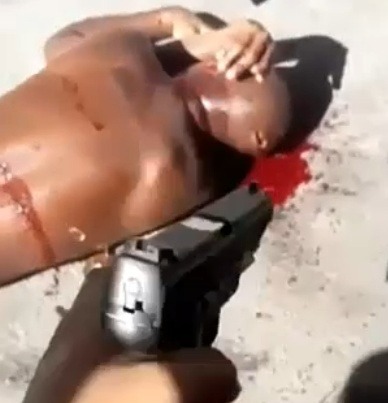 Man Gets His Head Riddled With Bullets By Opps In Brazil.