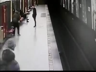 b18-year-old brave student grabs two-year-old who ran onto tracks