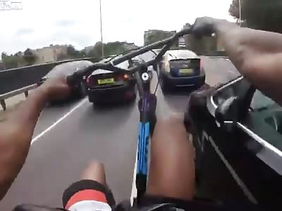 Cyclist acting like a dumbass as gets some instant karma
