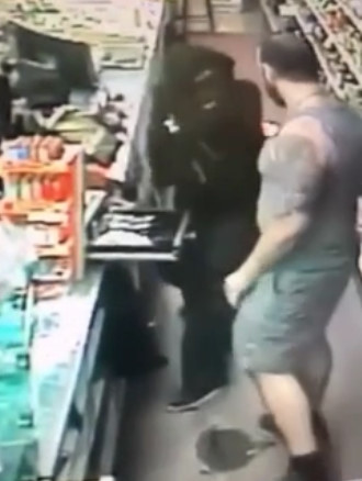 Armed Robber Seriously Manhandled by Liquor Store Owner