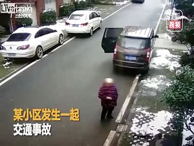 Old woman is run over and dragged by a van