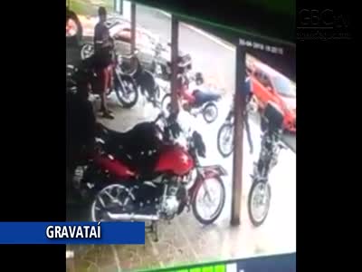 CCTV Murder of Young Man at Motorbike Shop in Brazil
