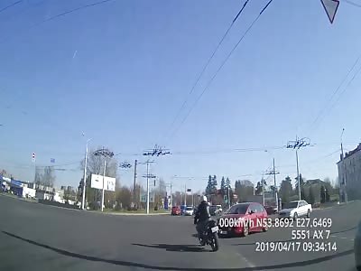 Collision with Car Sends Motorcyclist Flying