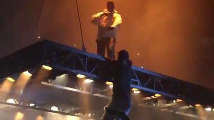 Fan Tries to Climb onto Kanyeâ€™s Floating Platform Only to get Dropped