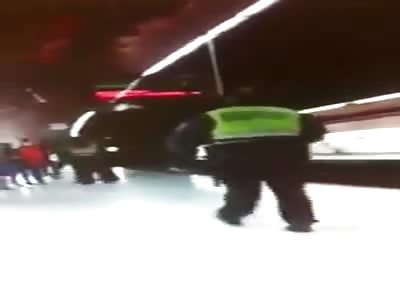 Shocking Video Shows Police Officer Thrown in Front of an Oncoming Train