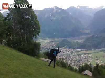 Horrible! Crosswinds send a paraglider plummeting to earth, killing him on impact
